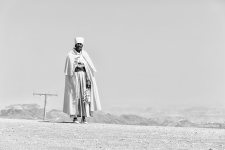  ETHIOPIA,LALIBELA-CIRCA  DECEMBER 2017--unidentified priest walking in the street  のeditorial素材