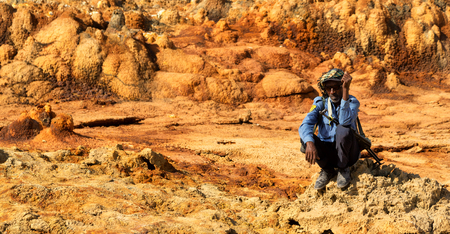 ETHIOPIA,DANAKIL-CIRCA  JANUARY 2018--unidentified irregular soldier looking at the state boarder
