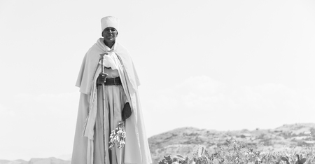  ETHIOPIA,LALIBELA-CIRCA  DECEMBER 2017--unidentified priest walking in the street  のeditorial素材