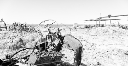 in  danakil ethiopia africa  in the   old abandoned  italian village   colony rusty antique car and hot concept of horror apocalypse の写真素材