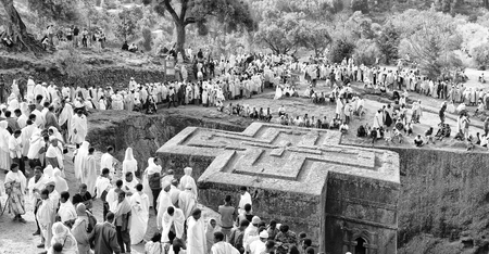 ETHIOPIA,LALIBELA-CIRCA  JANUARY 2018--unidentified people in crowd of  the genna celebration and the churchのeditorial素材