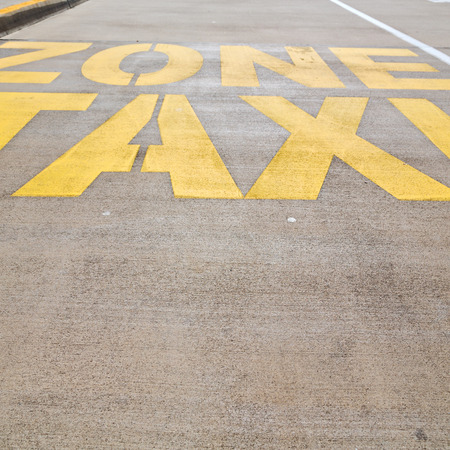 in  australia the line painted  in the  asphalt information for  the taxy zoneの写真素材