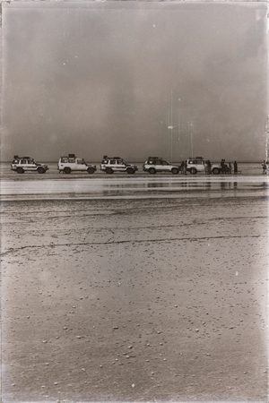 in  danakil ethiopia africa  in the lake for the saline lots of car and people watching the sun in relaxの写真素材