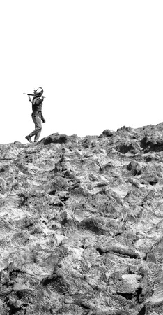 ETHIOPIA,DANAKIL-CIRCA  JANUARY 2018--unidentified   soldiers walking in the boarder  rockのeditorial素材