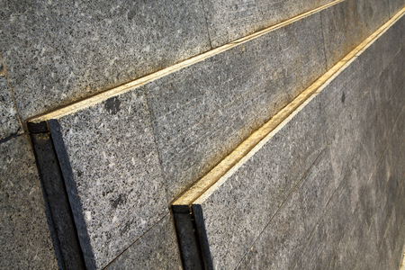 in the turbigo  street lombardy italy  varese abstract   pavement of a curch and marbleの写真素材