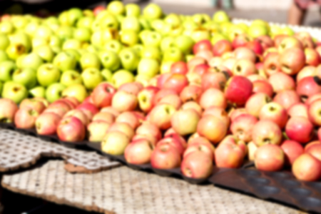blur  in south africa market red and yellow apples in the natural  lightの写真素材