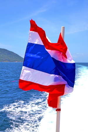 asia  kho samu bay isle waving flag    in thailand and south china sea の写真素材