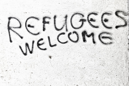 In Cyprus the spray paint in the wall with refugees welcome like concept of hospitalityの写真素材