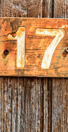 in cyprus in the old door the number seventeen in a rusty and dirty plate concept ofの写真素材