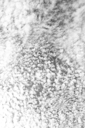 in the sky lots of clouds and space like concept of freedom and havenの写真素材