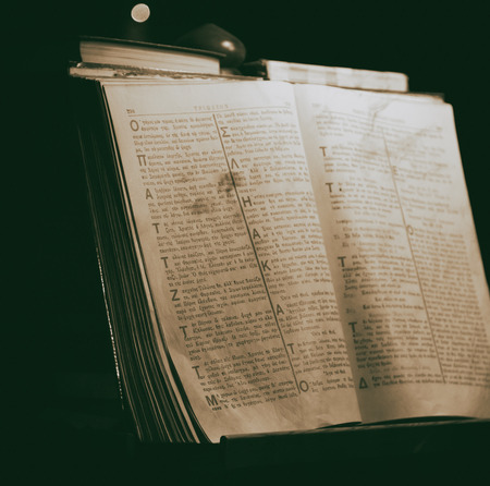 in cyprus the old greek bible in the dark church like concept of faith and religionの写真素材