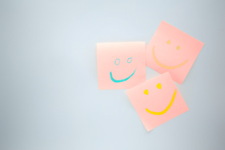 in the white background and empty space the smile in the post like concept of happinessの写真素材