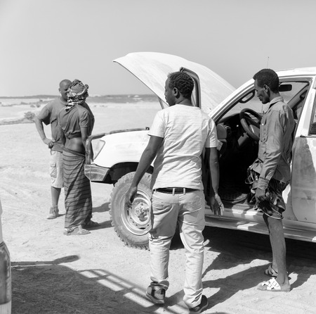 ETHIOPIA,DANAKIL-CIRCA  JANUARY 2018--unidentified  people and broken car in the land of afar peopleのeditorial素材