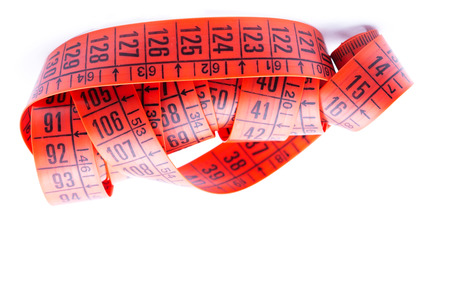 blur red  tape measure in the white light like concept of diet and lenght tool   and copy spaceの写真素材