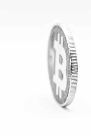 in the white background and copy space the coin of bitcoin like concept of future and investmentの写真素材