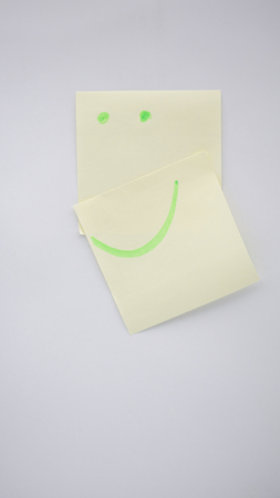 in the white background and empty space the smile in the post like concept of happinessの写真素材