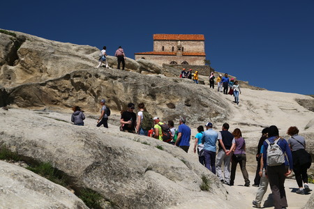 GEORGIA, UPLISTSIKHE-CIRCA MAY 2019--unidentified people near the antique town and caveのeditorial素材