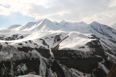 in georgia kazbegi the mountain  and the monument in the caucasus