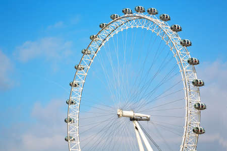 london eye in the spring sky and white cloudsのeditorial素材