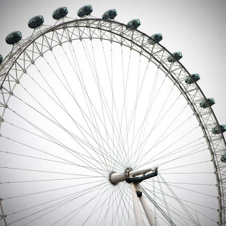 london eye in the spring sky and white cloudsのeditorial素材