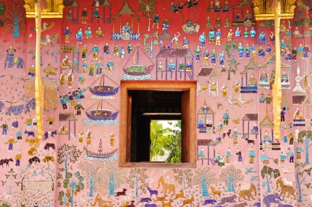 Glass mosaic at wat xieng thong temple wall, Luangprabang,Laosの写真素材