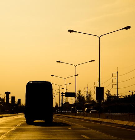 Silhouette tourist moving on the roadの写真素材