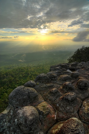 HDR landscape of mountain cliff at sunsetの写真素材
