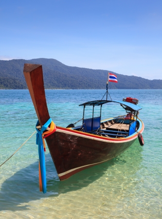 long tail boat sit on the beach, Rawi island, Thailandの写真素材