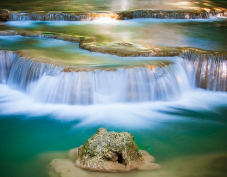 Deep forest Waterfall in Kanchanaburi, Thailandの写真素材