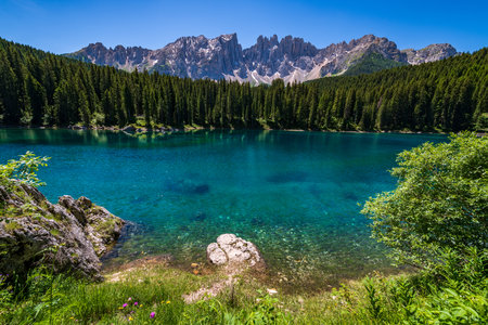 Karersee lake in the Dolomites, South Tyrol, Italy, also known as lake Carezza