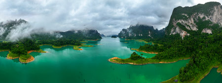 Aerial drone view of island on the lake, tropical Mountain peak , Khao Sok National Park, Thailand