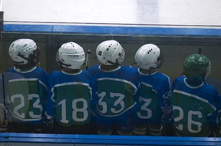 Children waiting of time to play hockeyの写真素材