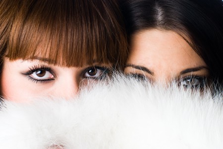 Portrait of a beautiful girl wearing white furの写真素材