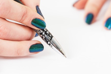 businesswoman hand writing in blank white paper.の写真素材