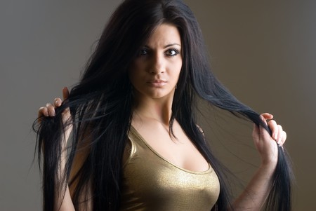 attractive young sexy woman on grey backgroundの写真素材