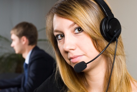 Beautiful business woman with headset