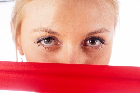 Woman with red tapeの写真素材