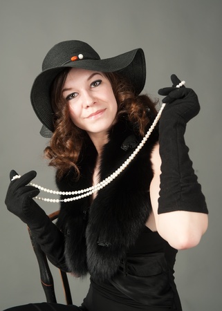 Young woman with beadsの写真素材