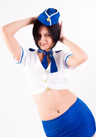 Attractive young stewardess isolated over white backgroundの写真素材