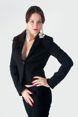 Portrait of elegantly dressed young gorgeous brunette womanの写真素材