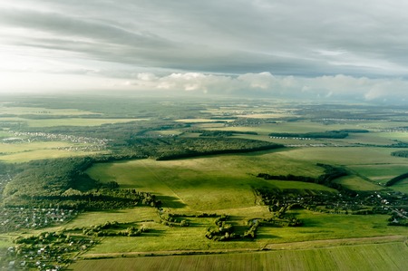 Aerial view cityscape from airplane at summerの写真素材