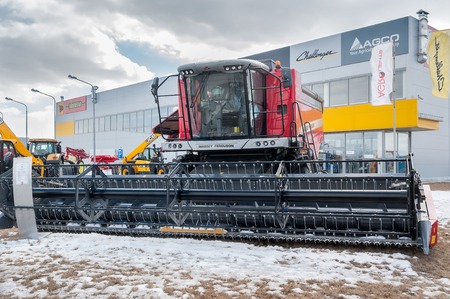 Tyumen, Russia - April 04  2014  IV Tyumen specialized exhibition  Agricultural Machinery and Equipment   Harvester demonstrationのeditorial素材