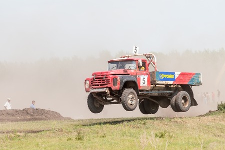Tyumen, Russia - July 5, 2009  Championship of Russia on truck autocross in the Silkin Ravine  Jumping truck on racing lineのeditorial素材