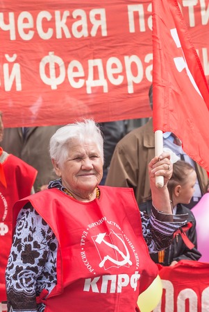 Tyumen, Russia - May 9  2009  Parade of Victory Day in Tyumen  Old woman - member of Commubist Party of Russian Federation on paradeのeditorial素材