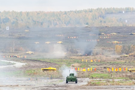 Nizhniy Tagil, Russia - September 25. 2013: BTR-82A armoured personnel carrier moves on shooting demonstration range. RAE-2013 exhibitionのeditorial素材
