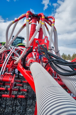 Tyumen, Russia - April 04. 2014: IV Tyumen specialized exhibition \\\\\\\\\\\\\\\"Agricultural Machinery and Equipment\\\\\\\\\\\\\\\". Additional equipment for tractor demonstrationのeditorial素材