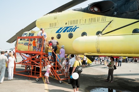 Tyumen, Russia - August 11, 2012: Air show - On a visit at UTair in heliport Plehanovo. People...