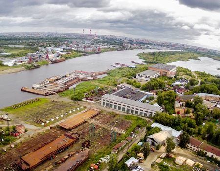 Tyumen, Russia - September 23, 2014: Bird eye view onto Tyumen Repair Yard on Tura riverのeditorial素材
