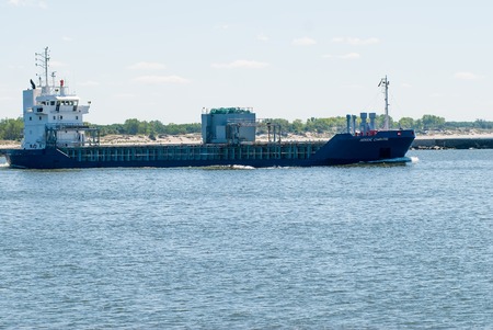 Baltiysk, Russia - June 29, 2010: : Nordic Chantal transport ship goes via Baltic sea channel (passage) to sea. Kaliningrad regionのeditorial素材