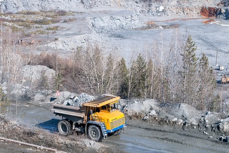 Kurmanka, Russia - April 10, 2010: Rock handler transports stones for crushed stone production. Kurmansky crushed-stone pit. Sverdlovsk regionのeditorial素材